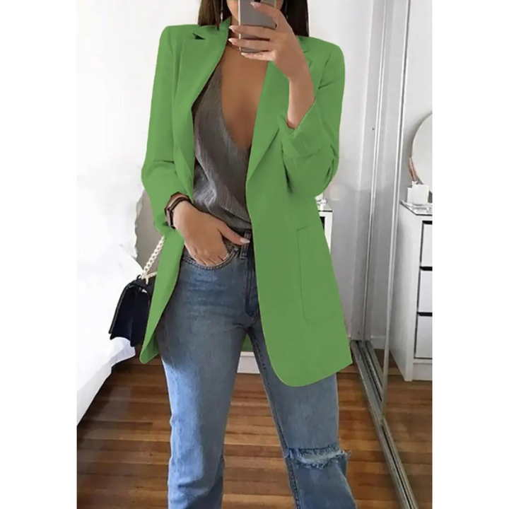 Stylish women's long blazer, a fashionable statement piece for workwear & elegant ladies fashion trends.