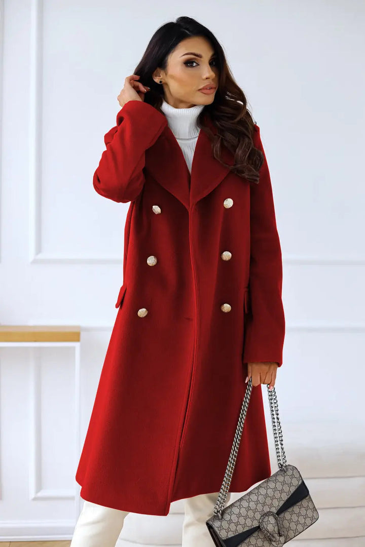 Model in elegant women's long double-breasted coat, a stylish & sophisticated winter fashion statement.