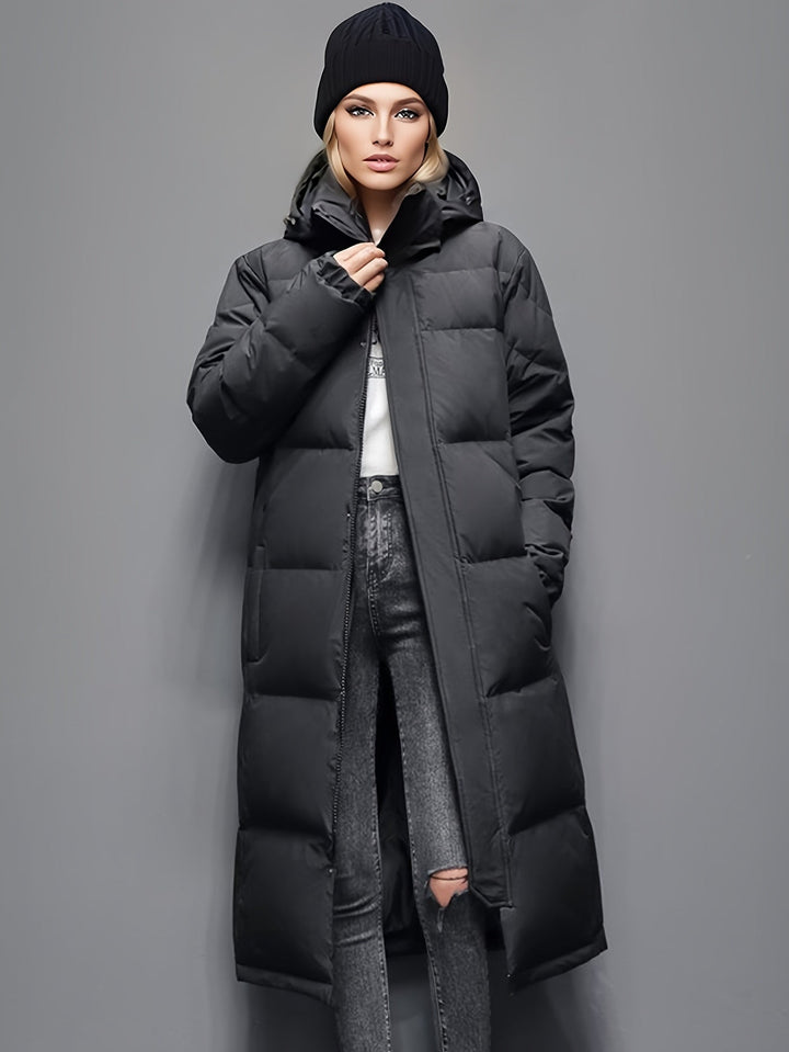 Premium women's elegant long down coat, a hooded winter jacket for severe cold weather protection.