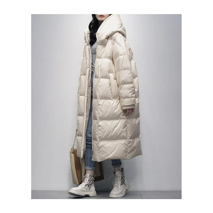 Red long padded winter jacket for women. Cozy and stylish outerwear, perfect for cold weather fashion.