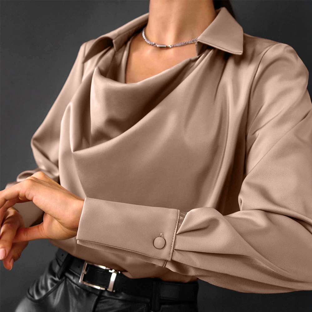Classic women's long-sleeve blouse, comfortable and ideal for office wear or stylish everyday fashion.