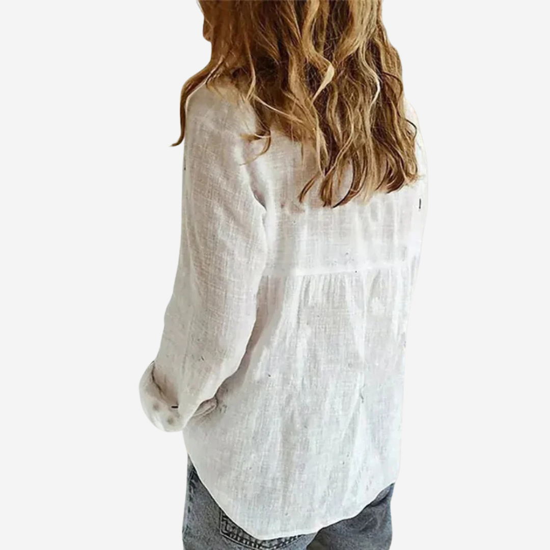 Comfortable, relaxed fit women's long sleeve button-down blouse. Versatile everyday & workwear fashion top.