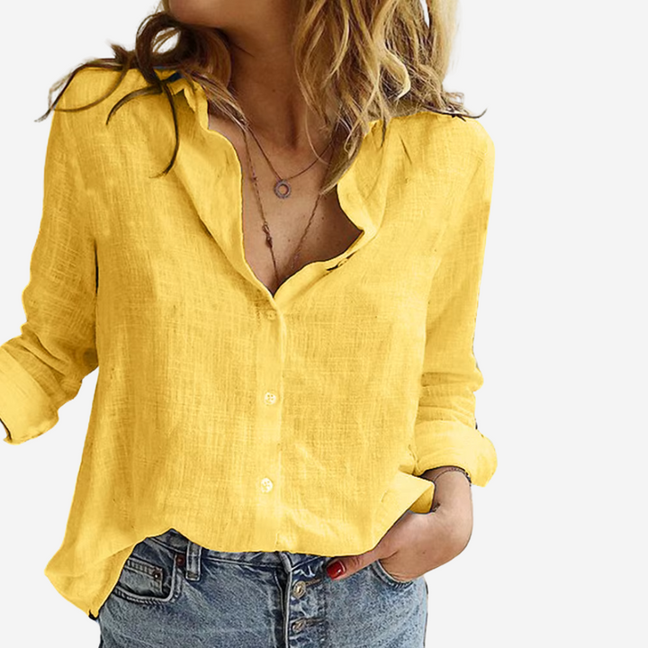Professional women's long sleeve button-down blouse. An elegant and comfortable choice for versatile workwear.