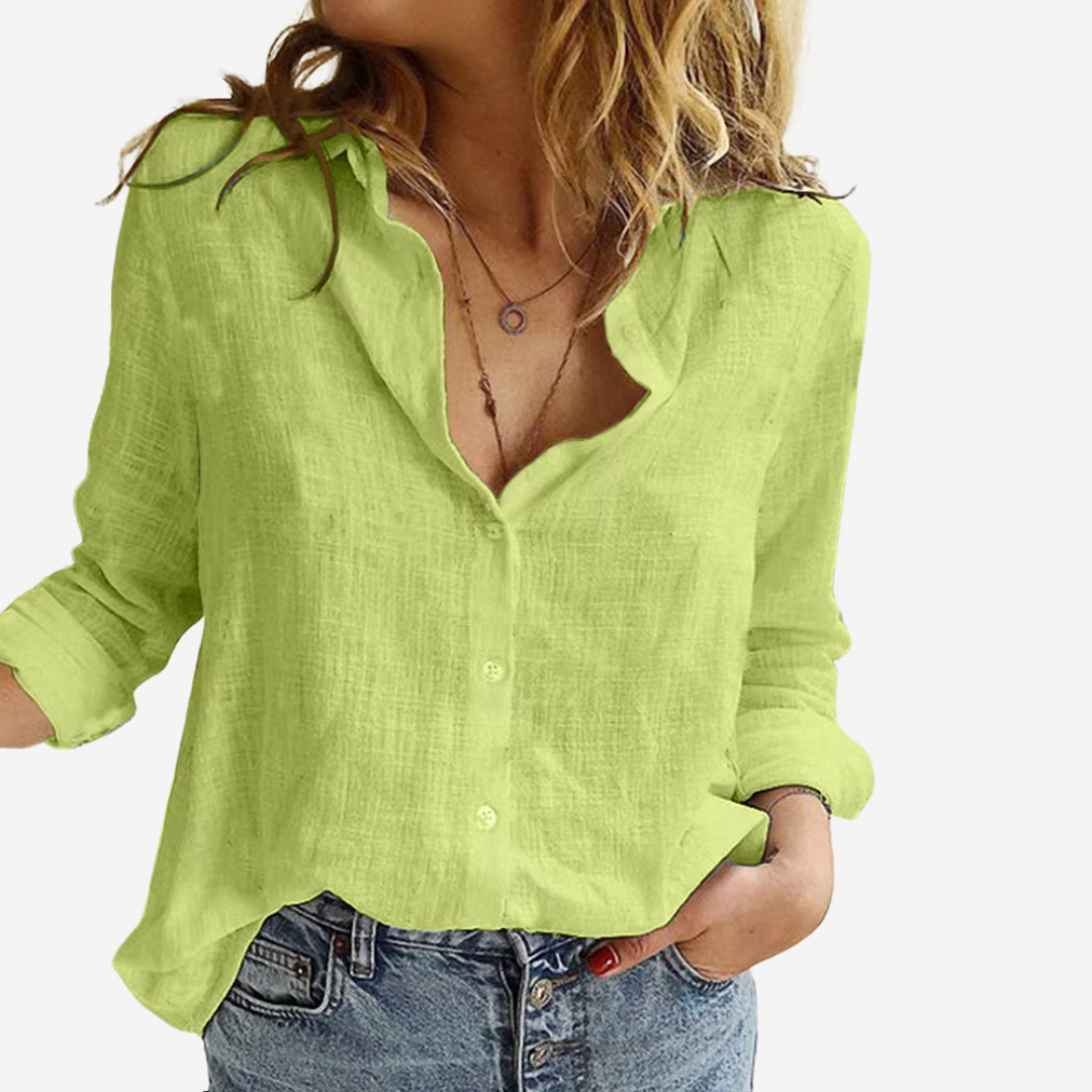 Chic women's button-down long sleeve top. Sophisticated design for elegant spring fashion and everyday wear.