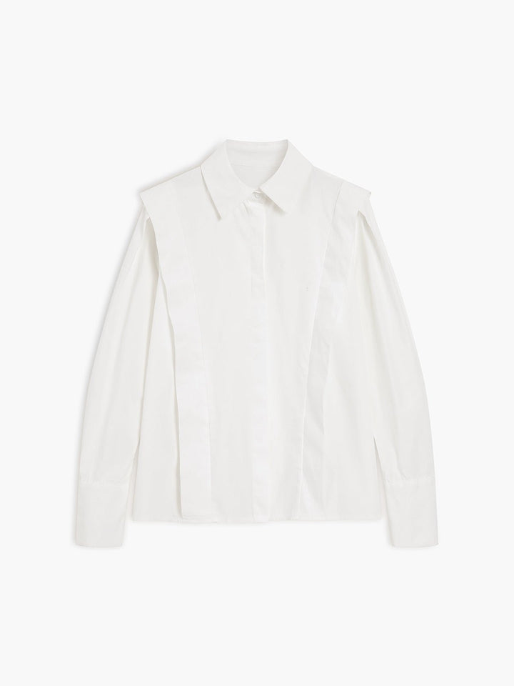Close-up: Elegant square collar & buttons on a women's long-sleeve button-down blouse. Chic top for office & casual fashion.