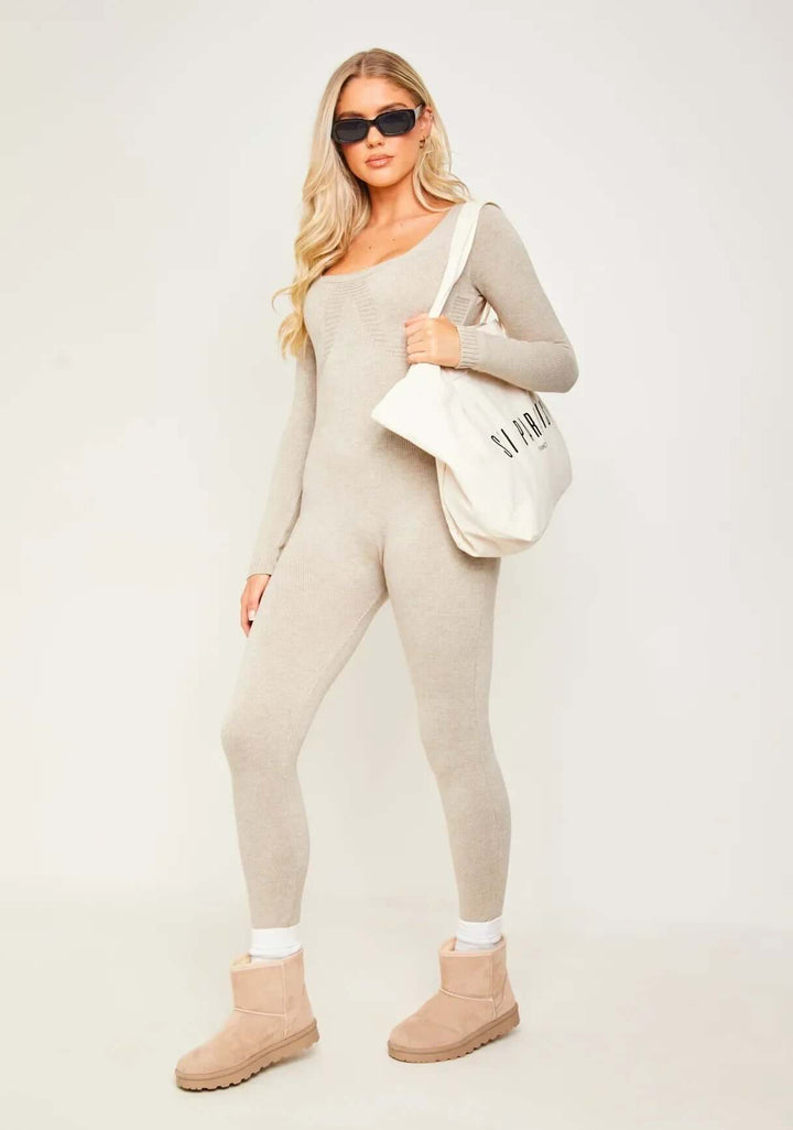 Elegant women's long sleeve jumpsuit in black polyester blend, perfect for sophisticated occasion wear.