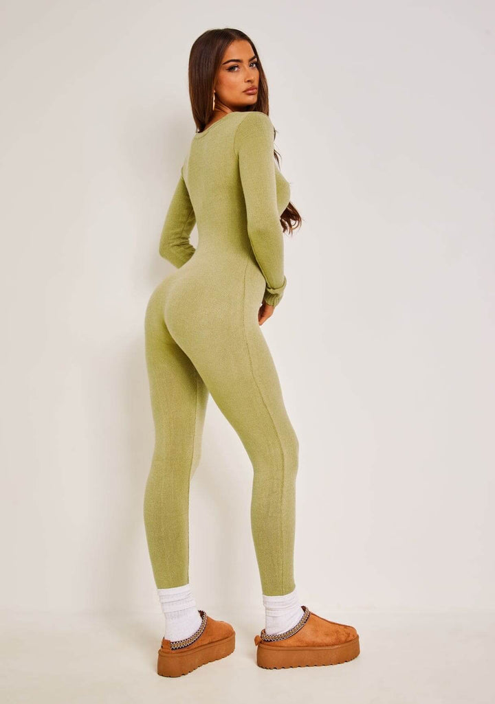 Versatile women's elegant long sleeve jumpsuit, featuring a tailored design for a chic and comfortable look.