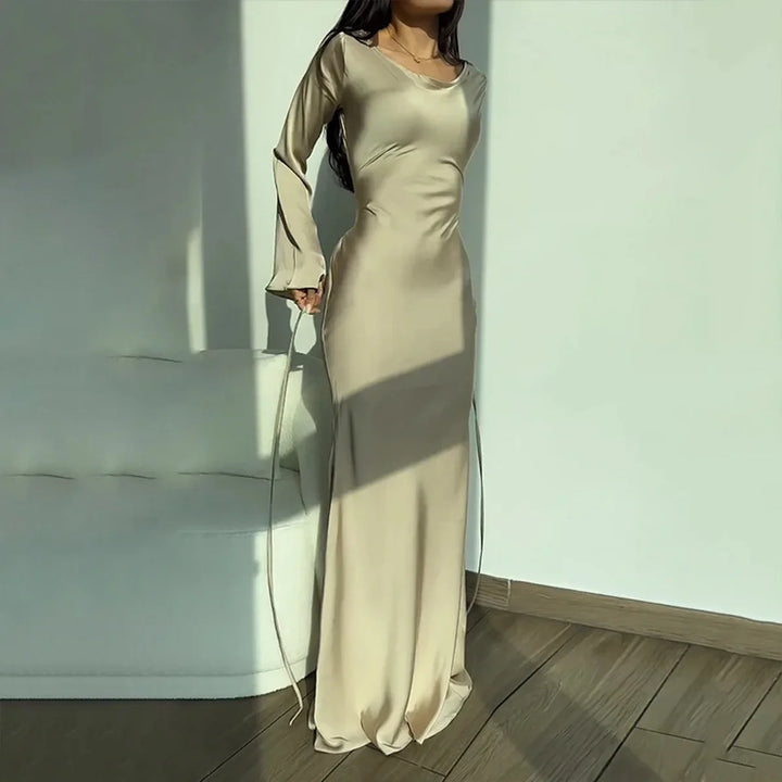 Modest long sleeve maxi dress for women, an elegant choice for formal events, parties, or wedding guests.