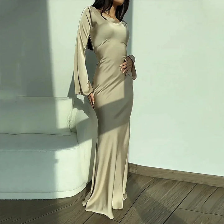 Formal long sleeve women's maxi dress. Elegant evening gown style, ideal for wedding guests & special occasions.