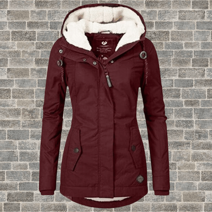 Fashionable women's long coat with luxurious fur lining, an elegant choice for winter warmth and style.