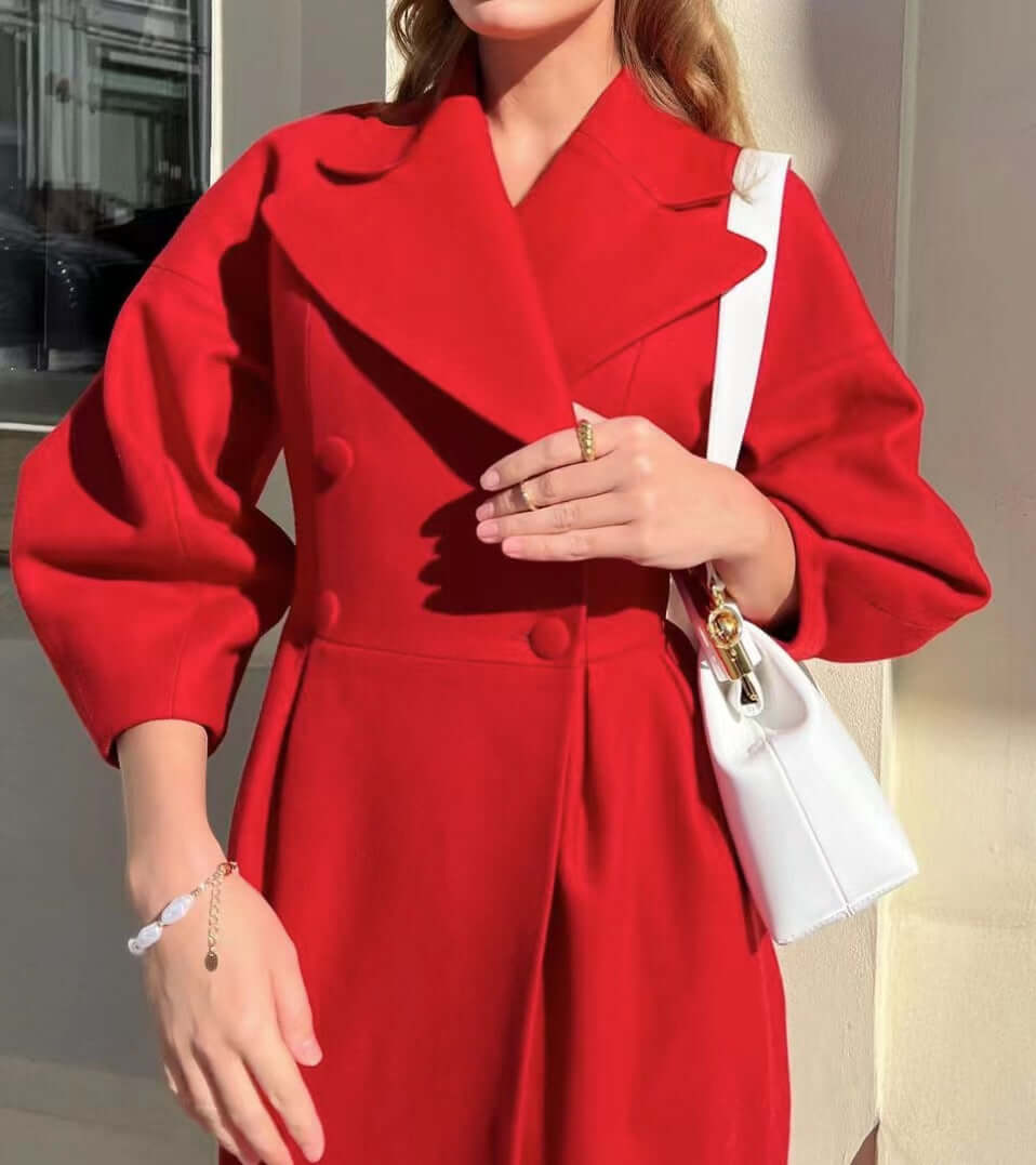 Stylish women's winter outerwear, an elegant long coat with unique lantern sleeves.