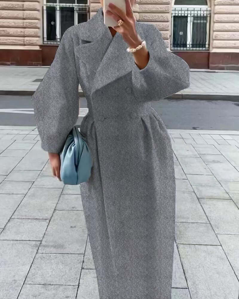 Warm & elegant women's long winter coat with chic lantern sleeves, perfect for cold weather.
