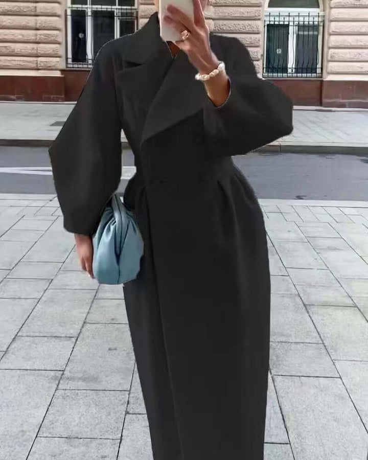 Women's elegant long winter coat featuring fashionable lantern sleeves.
