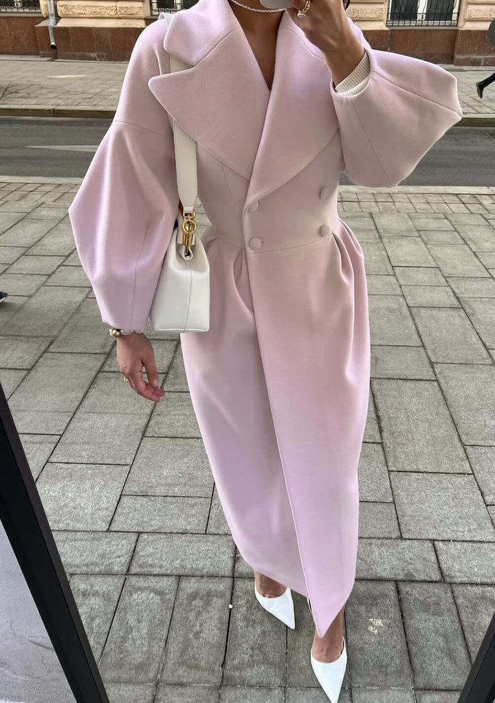 Chic women's long winter coat with elegant lantern sleeves, ideal for stylish layering.