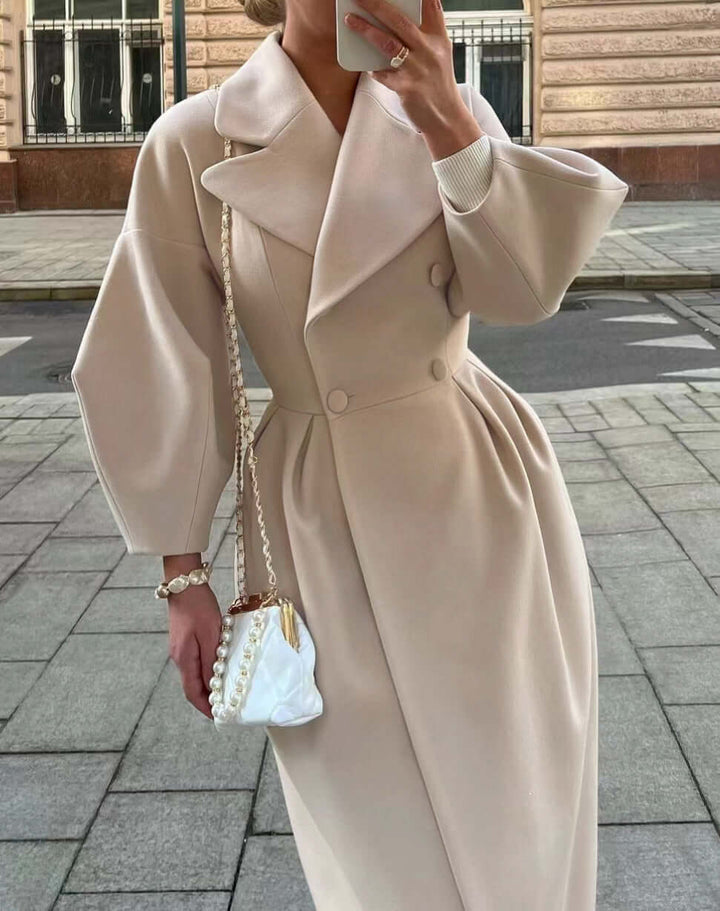 Sophisticated women's long winter coat with elegant lantern sleeves, a stylish jacket.