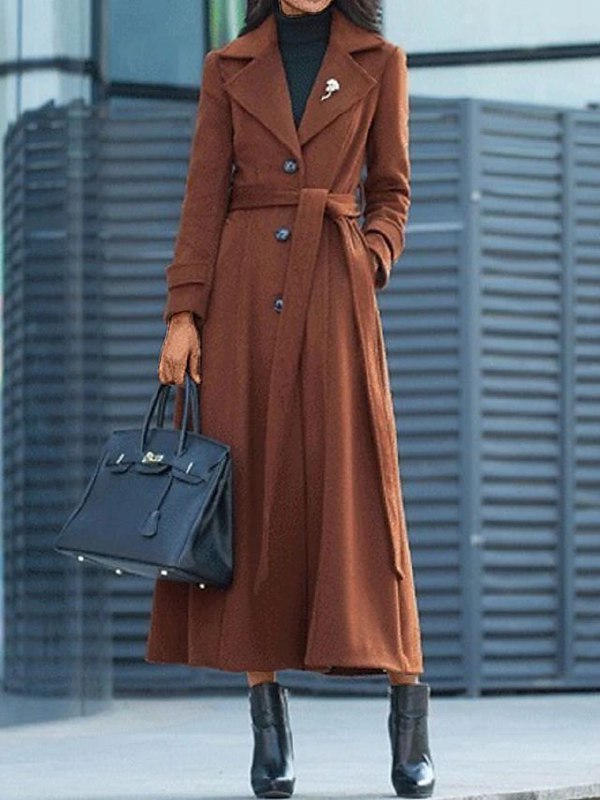 Classic women's winter long coat, elegant outerwear with a sophisticated shawl collar for cold weather style.