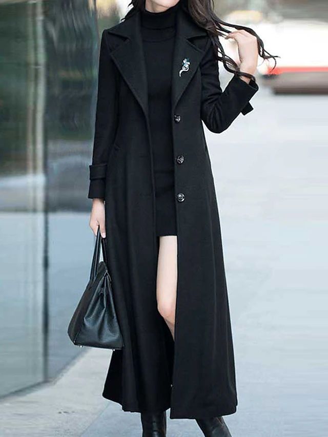Women's elegant long coat, perfect winter fashion outerwear featuring a flattering belted waist and shawl collar.