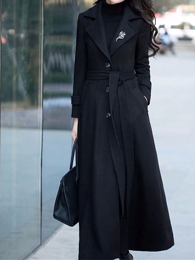 Stylish women's long wool coat, ideal for elegant cold weather outfits, classic design with a shawl collar.