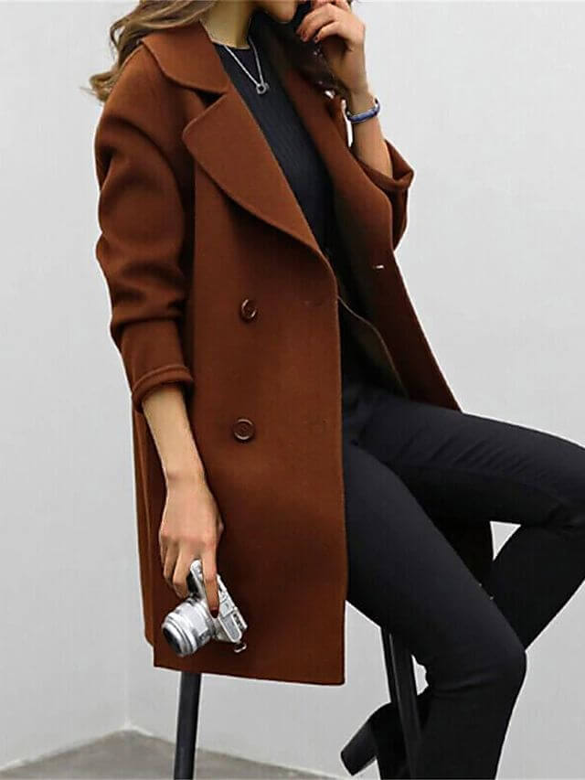 Long women's wool winter coat in a sophisticated classic style. Perfect warm outerwear for elegant ladies.