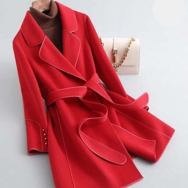 Stylish women's elegant long wool coat, a fashionable winter jacket adding sophistication to any cold weather outfit.