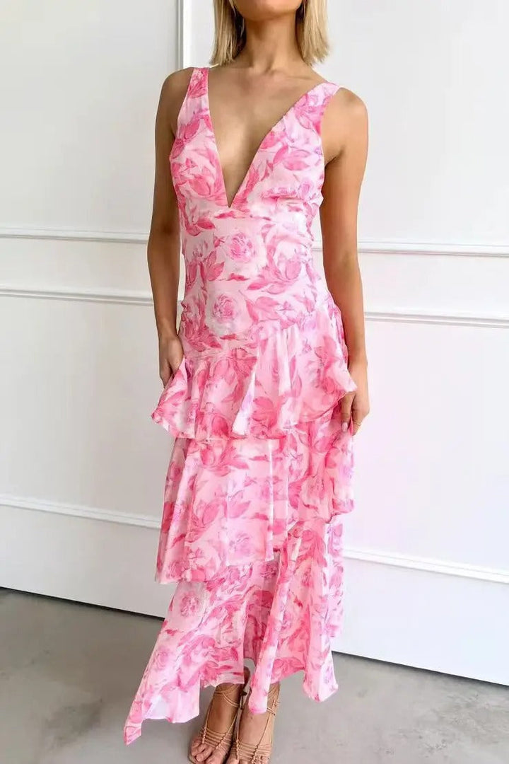Graceful women's flowing maxi dress with V-neck & tiered skirt. Ideal for summer elegance, beach, or formal events.