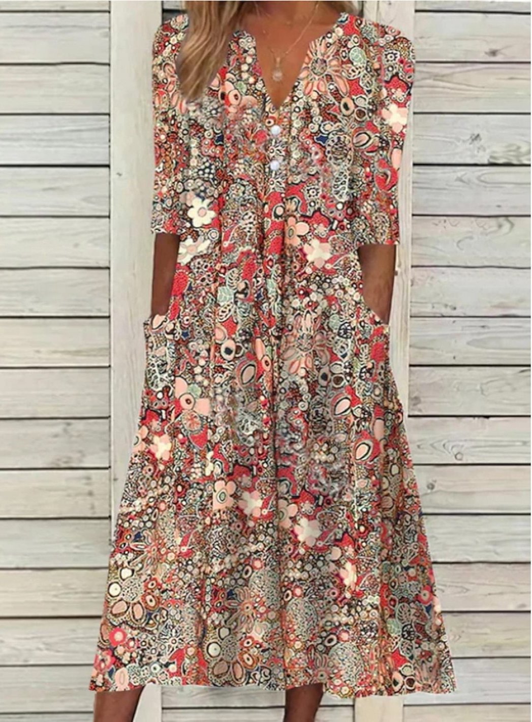 Sophisticated women's elegant maxi dress, a flattering spring fashion choice. Part of the clearance collection.