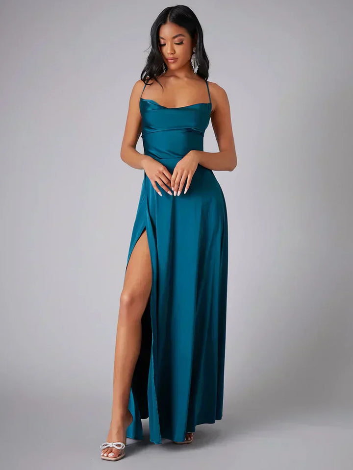 Elegant women's maxi dress with high slit and open back, perfect for evening wear & special occasions.