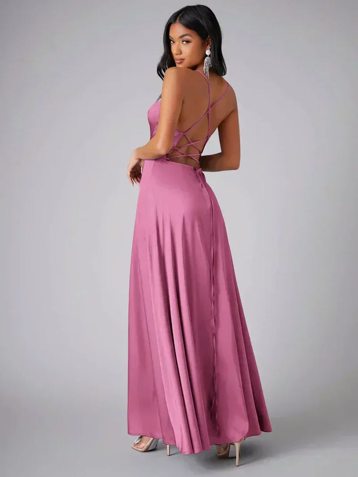 Formal evening gown for women, featuring a stunning high slit & elegant open back design. Ideal for events.