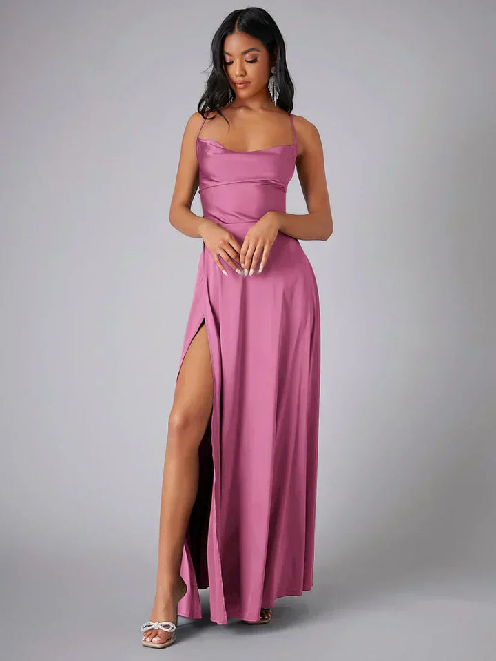 Chic party dress for women with a flattering fit, high slit, and alluring open back. Perfect for special nights.