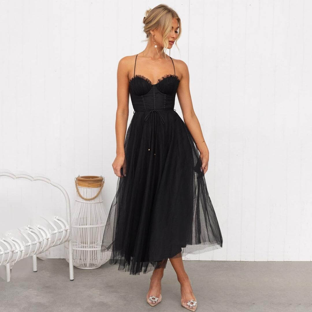 Elegant women's mesh midi dress with delicate details, perfect for evening & formal wear.