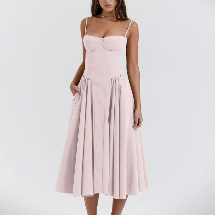 Women's bustier midi cocktail dress with a graceful pleated skirt, perfect for elegant evening wear.