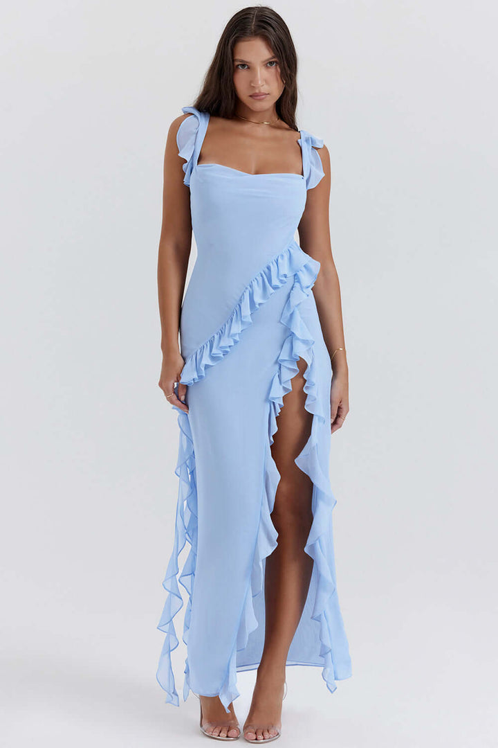 Women's elegant midi dress styled with accessories, perfect for a sophisticated evening look or formal event.