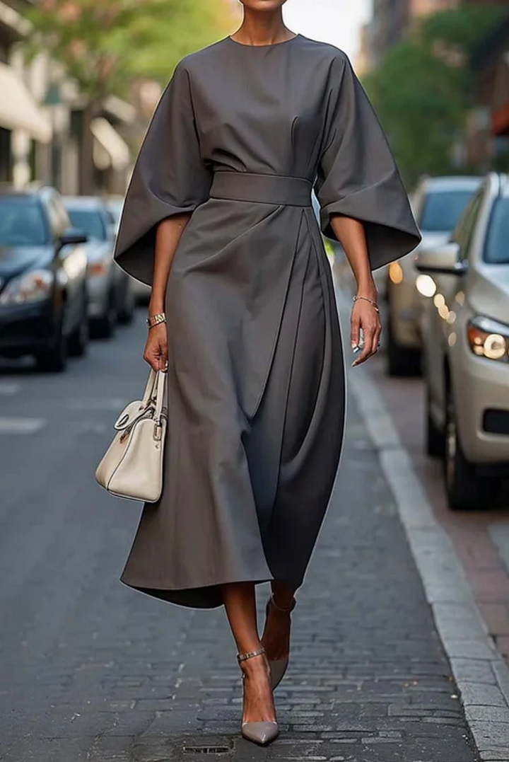 Chic women's midi dress with comfortable flowing sleeves, offering a relaxed yet sophisticated style.