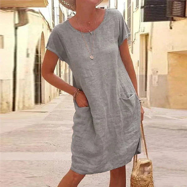 Plus size friendly women's elegant midi dress, comfortable & stylish, offering tummy covering for all figures.