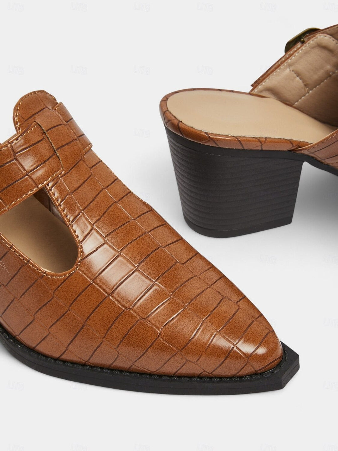 Sophisticated women's dress mules with a block heel, slip-on convenience, and cut-out detail for elegant style.