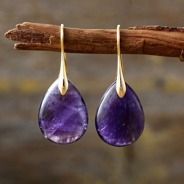 Elegant women's natural stone drop earrings. Teardrop dangle design, perfect fashion accessory or gift for her.