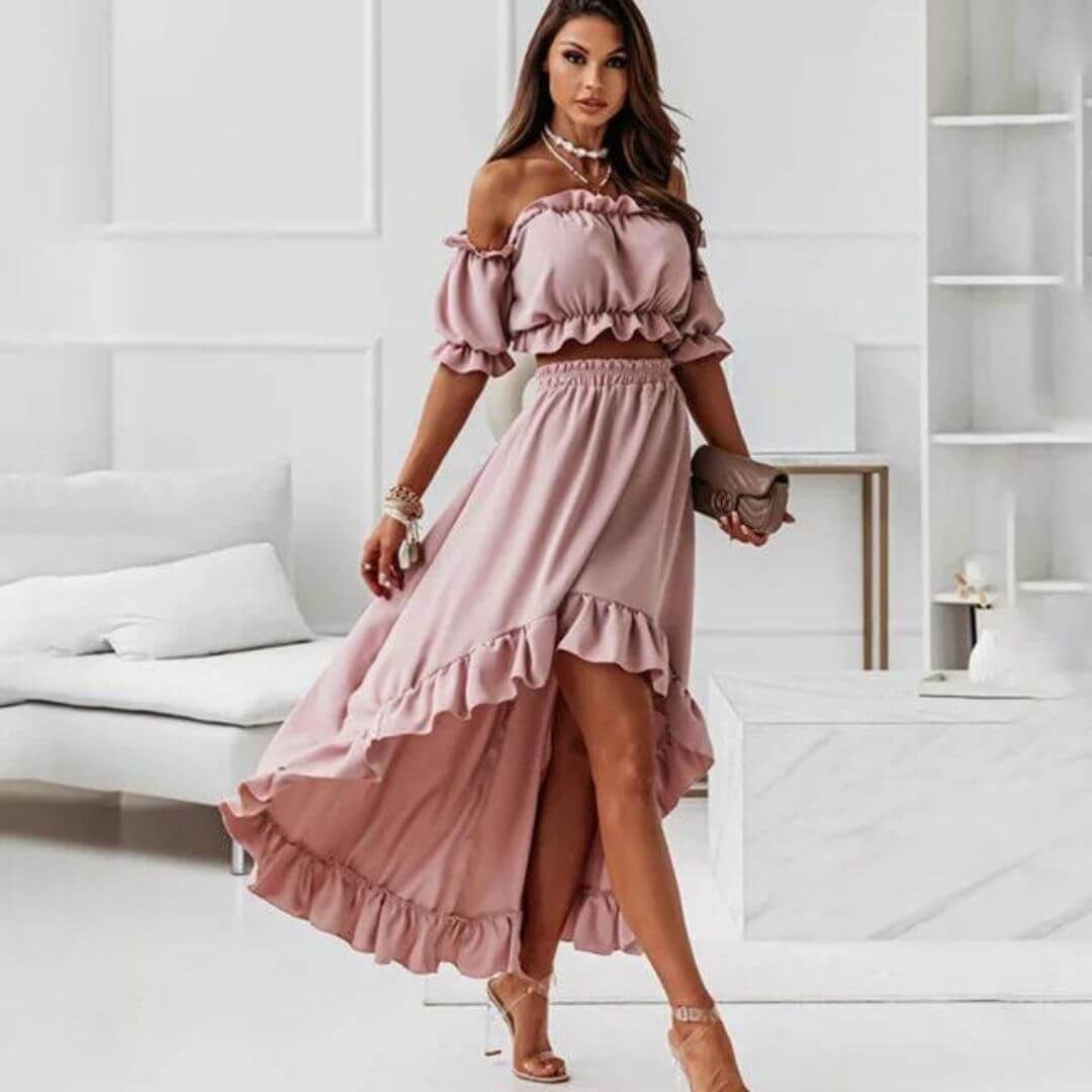 Women's off-shoulder frill crop top and high-low skirt set, a flattering two-piece outfit for warm weather.