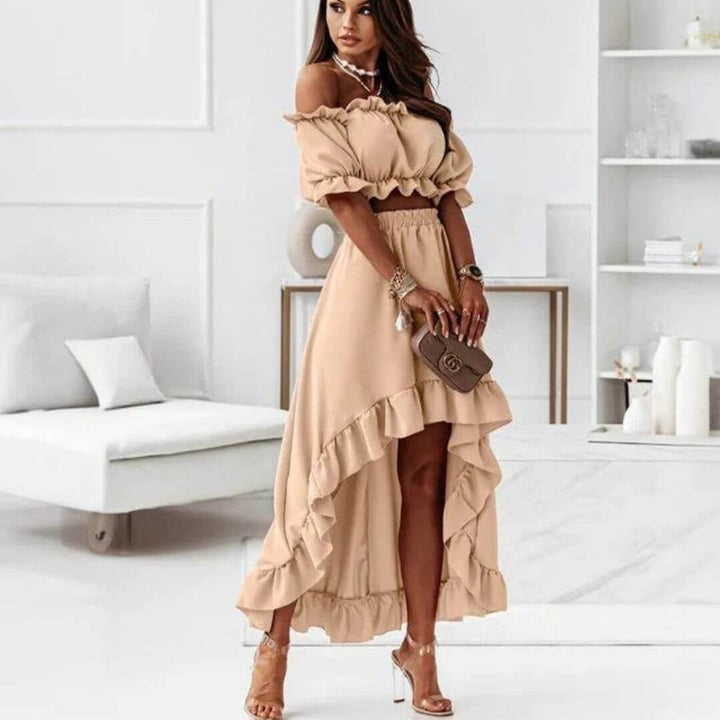 Stylish women's two-piece outfit: off-shoulder frill crop top and flowing high-low skirt. Versatile summer fashion.
