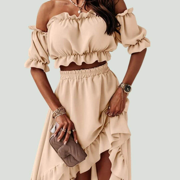 Chic women's off-shoulder frill crop top & high-low skirt set, ideal party wear for elegant summer occasions.