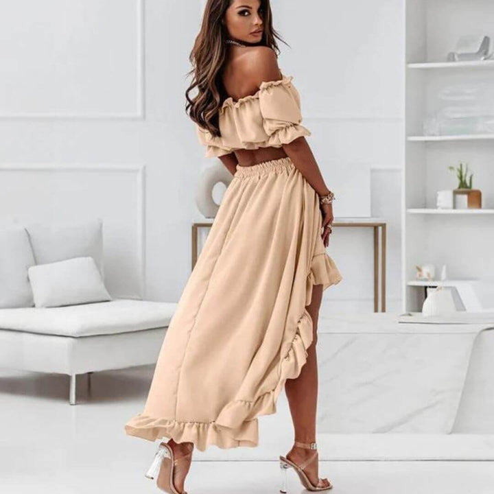 Lightweight women's summer outfit: an off-shoulder frill crop top paired with a trendy high-low skirt for comfort.