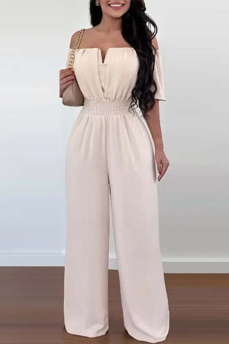 Elegant women's off-shoulder short sleeve jumpsuit. Chic one-piece for versatile summer fashion, made from polyester.