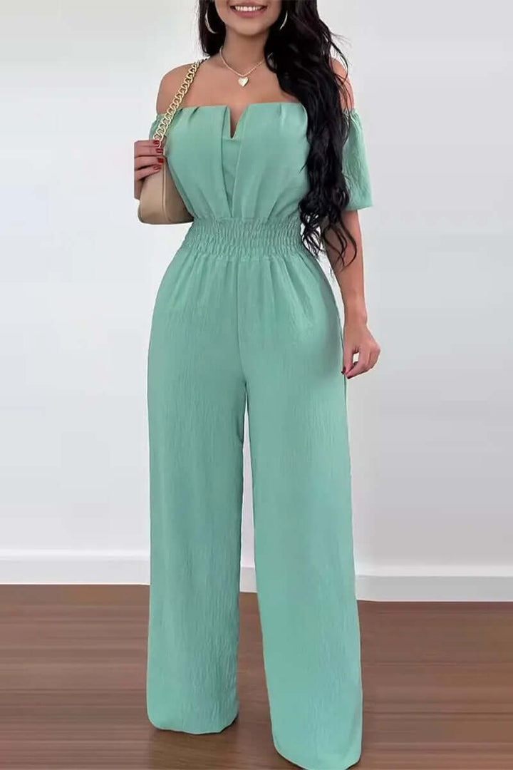 Casual women's off-shoulder short sleeve jumpsuit. Comfortable polyester one-piece for relaxed summer fashion.
