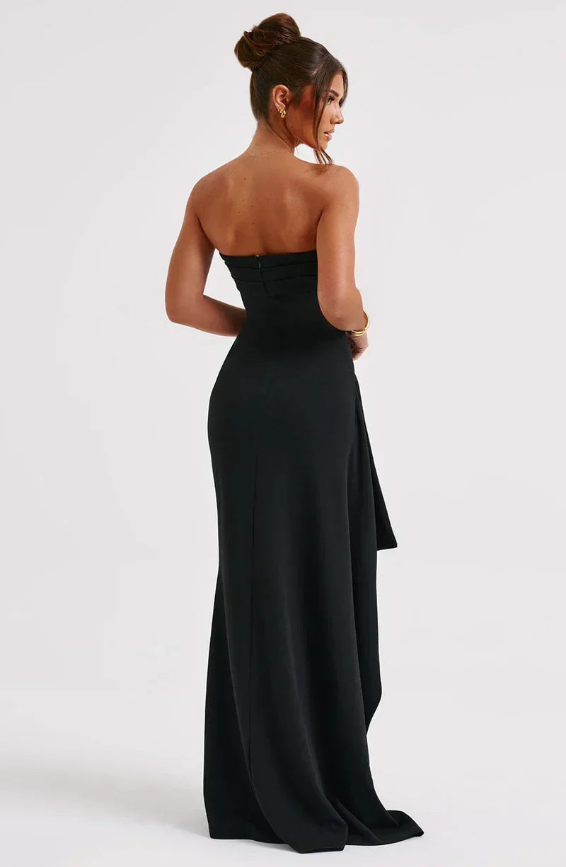 Full-length women's off-shoulder maxi dress, a sleek and elegant choice for any special evening.