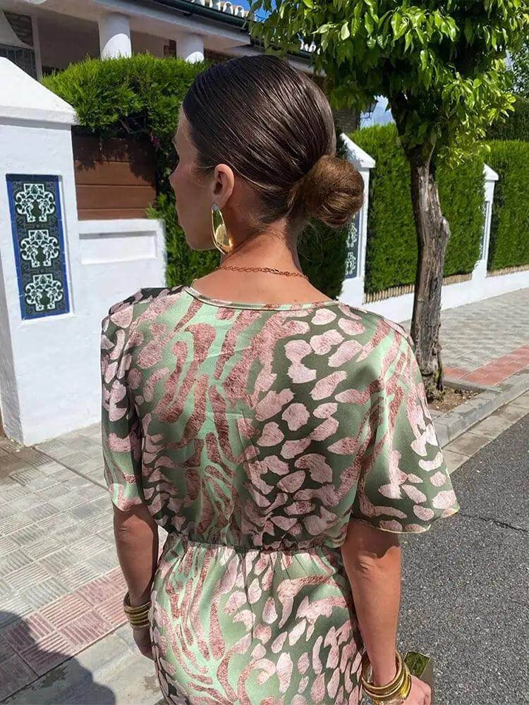 Chic ladies' floral satin midi dress, an elegant V-neck design with short sleeves, suitable for parties & summer fashion.