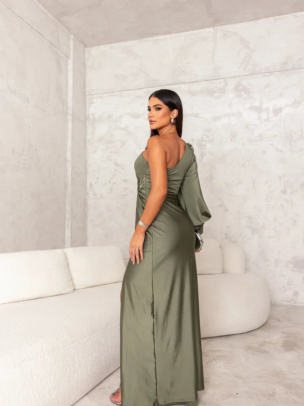 Stylish one-shoulder long evening dress for women, featuring elegant draping and a sophisticated look for parties.