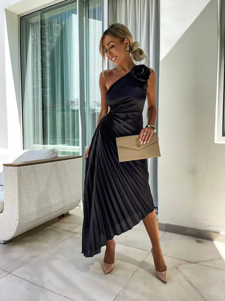 Statement women's one-shoulder midi dress with elegant pleating, a stunning look for any formal event.