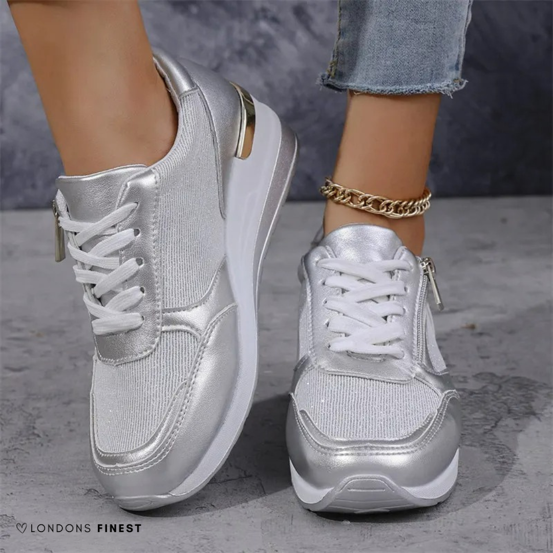 Silver women's ergonomic walking shoes. Enjoy all-day comfort, cushioned foot support & versatile style for daily wear.
