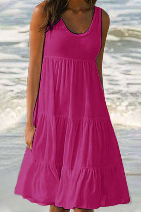 Flowy women's tiered midi dress, a comfortable and elegant choice for spring casual or summer occasions.