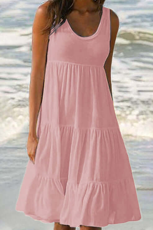 Comfortable & versatile women's flowy tiered midi dress, ideal for elegant spring fashion or casual summer wear.