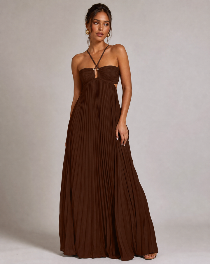 Chic women's halter neck maxi dress with elegant pleats & open back, ideal for summer parties.